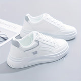 Zapatillas blancas chic de comodidad ligera