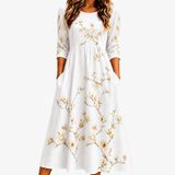 Vestido Midi Floral Marfil con Bolsillos
