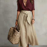 Rocío | Conjunto de Dos Piezas: Top Negro y Falda Midi Verde Oliva
